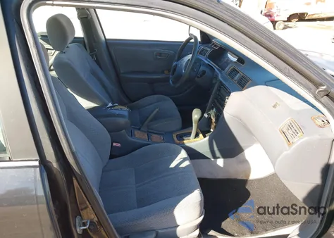 2001 Toyota Camry Le z USA, uszkodzony, nr VIN JT2BG22KX10539380